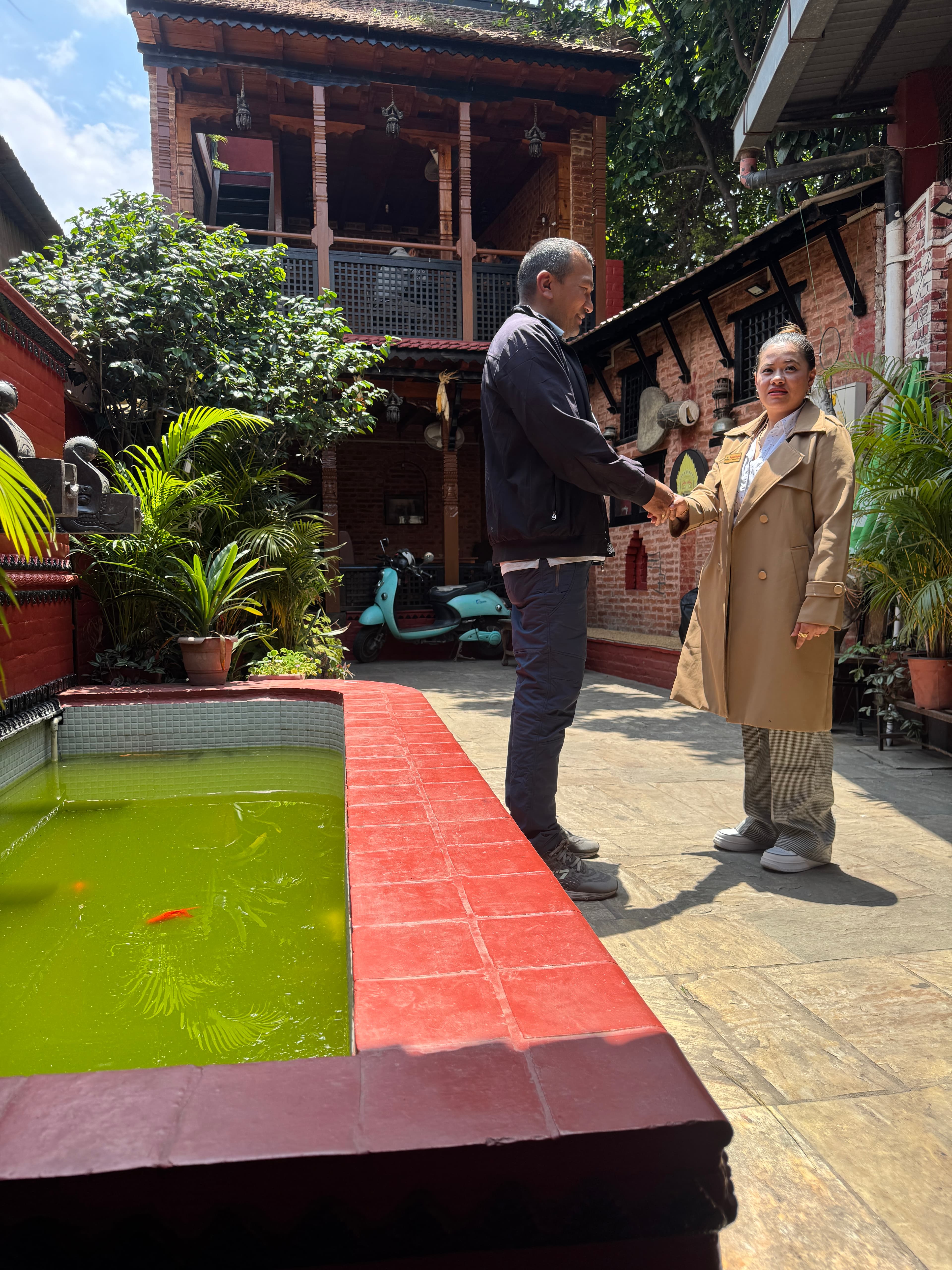Our dedicated team members at the courtyard entry